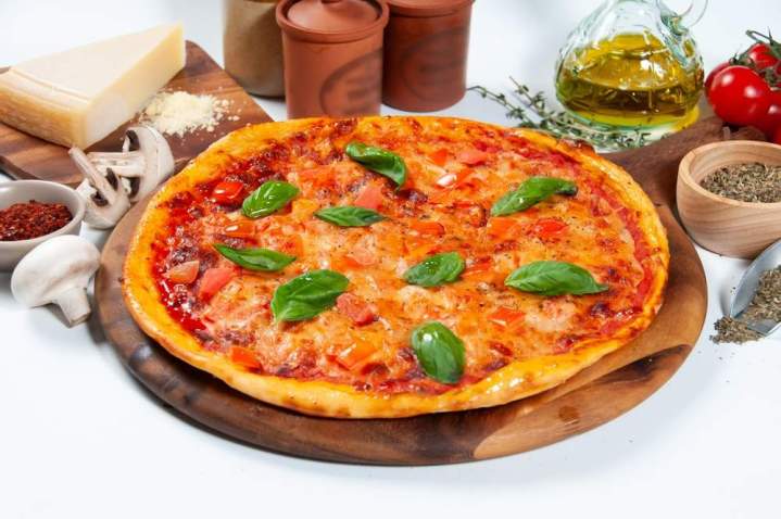 Pizza garnie épicée Lons-le-Saunier